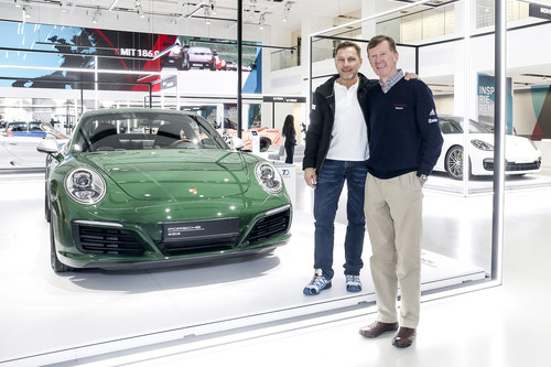 &quot;70 Jahre Porsche Sportwagen&quot; im &quot;Drive&quot;-Forum des Volkswagen-Konzerns in Berlin. V.l.n.r.: Schauspieler Richy Müller und Rallye-Legende Walther Röhrl neben dem ein millionsten Porsche 911 in irisch grün. 
