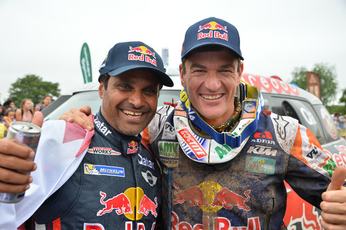 Dakar-Sieger 2015: Mini-Fahrer Nasser Al-Attiyah (l.) und KTM-Pilot Marc Coma.