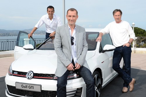Erol Sander, Heikko Deutschmann, Helmut Zierl vor dem Volkswagen Golf GTI.