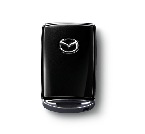 Transponder-Schlüsselgehäuse von Mazda in Onyxschwarz Metallic.